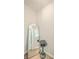 A small bathroom with a mirror and a dark bowl at 3264 Stonehaven Dr, North Charleston, SC 29420