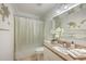 Updated bathroom with granite countertop, white vanity, and shower/tub combo at 3264 Stonehaven Dr, North Charleston, SC 29420