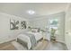 Spacious bedroom with wood-look floors, a comfy bed, and tasteful decor at 3264 Stonehaven Dr, North Charleston, SC 29420