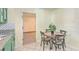 Small dining area with round table and four chairs near kitchen at 3264 Stonehaven Dr, North Charleston, SC 29420