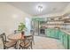 Eat in kitchen with stainless steel appliances and green cabinets at 3264 Stonehaven Dr, North Charleston, SC 29420