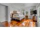 Bedroom with hardwood floors and large windows at 371 Live Palmetto Bluff, Mount Pleasant, SC 29464