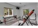 Home gym with workout equipment and large windows offering natural light at 371 Live Palmetto Bluff, Mount Pleasant, SC 29464