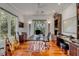 Home office with built-in bookshelves and hardwood floors at 371 Live Palmetto Bluff, Mount Pleasant, SC 29464