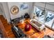 Living room with hardwood floors, fireplace, and access to a patio at 371 Live Palmetto Bluff, Mount Pleasant, SC 29464