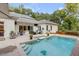 Luxury pool with fountains, spacious patio, and ample seating at 371 Live Palmetto Bluff, Mount Pleasant, SC 29464