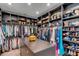 Spacious walk-in closet with ample shelving and hanging space for clothes and shoes at 371 Live Palmetto Bluff, Mount Pleasant, SC 29464