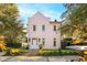 Pink two-story house with landscaped yard and brick driveway at 429 Venning St, Mount Pleasant, SC 29464