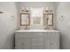 Bathroom boasts double vanity, marble countertop and gold fixtures at 5748 Pilgrim Ave # D, Hanahan, SC 29410