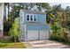 Two-story light blue house with a two-car garage at 5748 Pilgrim Ave # D, Hanahan, SC 29410