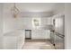 Modern kitchen featuring white cabinets, stainless steel appliances, and marble countertops at 5748 Pilgrim Ave # D, Hanahan, SC 29410