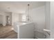 Spacious upstairs hallway with a modern light fixture at 5748 Pilgrim Ave # D, Hanahan, SC 29410