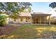 House exterior and backyard with screened porch at 103 Isherwood Dr, Goose Creek, SC 29445