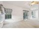 Sunlit Gathering room featuring sliding glass doors and carpet at 103 Isherwood Dr, Goose Creek,  29445