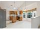 Bright kitchen features wood cabinets, stainless steel appliances, and an island at 103 Isherwood Dr, Goose Creek,  29445