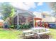 Spacious backyard with screened porch, pergola, and playset at 1421 Oldenburg Dr, Mount Pleasant, SC 29429