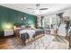 Bright bedroom featuring a comfortable bed and an accent wall at 1421 Oldenburg Dr, Mount Pleasant, SC 29429