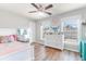 Spacious bedroom with a queen bed, dresser, and large windows at 1421 Oldenburg Dr, Mount Pleasant, SC 29429