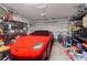 Garage with shelving, sports equipment, and a red sports car at 1421 Oldenburg Dr, Mount Pleasant, SC 29429