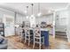 Modern kitchen with island, stainless steel appliances, and granite countertops at 1421 Oldenburg Dr, Mount Pleasant, SC 29429
