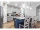 Modern kitchen with island, stainless steel appliances, and granite countertops at 1421 Oldenburg Dr, Mount Pleasant, SC 29429