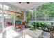 Cozy screened porch, perfect for relaxing and enjoying the outdoors at 1421 Oldenburg Dr, Mount Pleasant, SC 29429