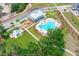 Aerial view of community pool, clubhouse, playground, and landscaping at 1643 Siloh Dr # 485, Mount Pleasant, SC 29466