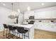 Modern kitchen with white cabinets, stainless steel appliances and an island at 177 Surfbird Rd # 510, Summerville,  29486