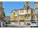 Colorful multi-unit building with attached garages at 204 Michigan Ave # C3, Folly Beach, SC 29439