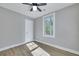 Bedroom with hardwood floors, ceiling fan and a closet at 2671 Olympia Ave, North Charleston,  29405