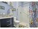 Accessible bathroom with walk-in shower and modern vanity at 3034 Cane Slash Rd, Johns Island, SC 29455