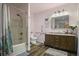Bathroom with walk-in shower, bathtub, and updated vanity at 3034 Cane Slash Rd, Johns Island, SC 29455