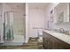 Accessible bathroom with walk-in shower, grab bars, and updated vanity at 3034 Cane Slash Rd, Johns Island, SC 29455