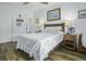 Serene bedroom with hardwood floors and a ceiling fan at 3034 Cane Slash Rd, Johns Island, SC 29455