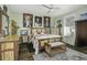 Peaceful bedroom with hardwood floors and custom wood furniture at 3034 Cane Slash Rd, Johns Island, SC 29455
