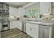 Modern kitchen featuring stainless steel appliances and granite countertops at 3034 Cane Slash Rd, Johns Island, SC 29455