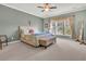 Main bedroom with carpeted floors and a view of the backyard at 307 Spyglass Dr, Summerville,  29486