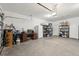 Organized garage with workbench and storage shelving at 310 Autumn Azalea Way, Summerville,  29486