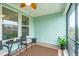 Cozy screened porch with seating area and ceiling fan at 310 Autumn Azalea Way, Summerville, SC 29486