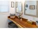 Bathroom featuring a live-edge wood vanity and vessel sink at 3611 Yacht Club Rd # B, Edisto Island, SC 29438