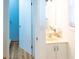 Small half bathroom with pedestal sink and light blue walls at 3611 Yacht Club Rd # B, Edisto Island, SC 29438