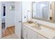 Bright bathroom with updated vanity and a large mirror at 3611 Yacht Club Rd # B, Edisto Island, SC 29438
