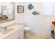 Bright bathroom with contemporary vanity and nautical-themed decor at 3611 Yacht Club Rd # B, Edisto Island, SC 29438