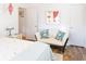 Bedroom with a couch and access to another room at 3611 Yacht Club Rd # B, Edisto Island, SC 29438