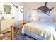 Bedroom with a queen bed and ocean-themed wall decor at 3611 Yacht Club Rd # B, Edisto Island, SC 29438
