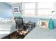 Bedroom with two twin beds, desk, and ocean view at 3611 Yacht Club Rd # B, Edisto Island, SC 29438