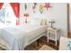 Bedroom with a bed, nightstand and access to balcony at 3611 Yacht Club Rd # B, Edisto Island, SC 29438