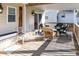 Relaxing outdoor deck with wicker furniture, perfect for enjoying the summer breeze at 3611 Yacht Club Rd # B, Edisto Island, SC 29438