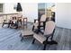 Relaxing deck area furnished with Adirondack chairs and side table at 3611 Yacht Club Rd # B, Edisto Island, SC 29438