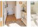 Bright and airy entryway with rustic wood floors and charming decor at 3611 Yacht Club Rd # B, Edisto Island, SC 29438